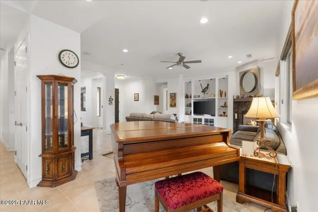 a dining room with furniture and window