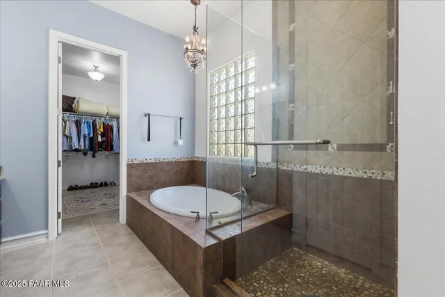 a bath tub sitting next to a window