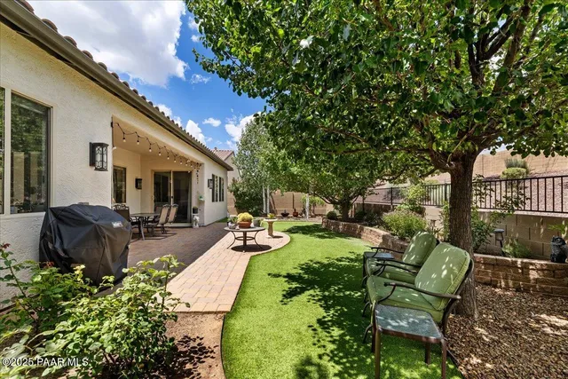 a view of a backyard with a garden
