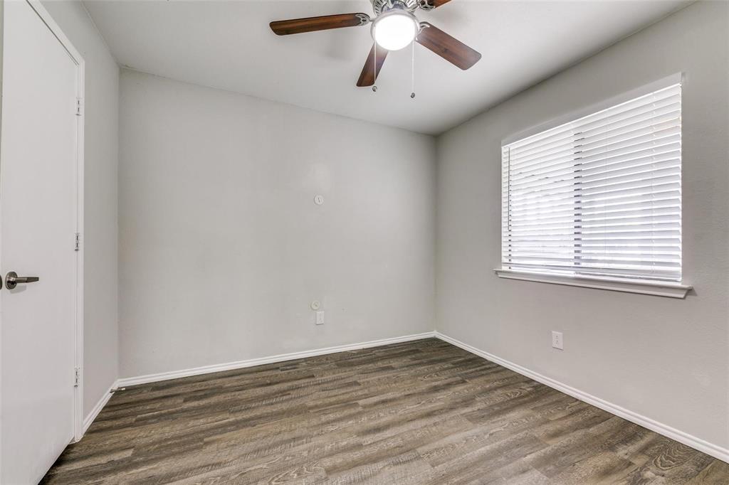 701 Kipling Drive Plano, TX 75023 - Photo 16 of 24 wooden floor in an empty room with a window