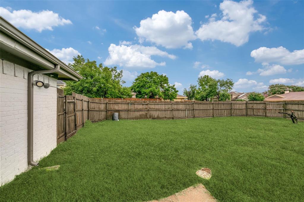 701 Kipling Drive Plano, TX 75023 - Photo 23 of 24 a view of a backyard