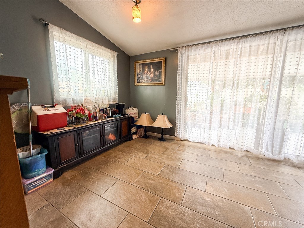 6712 La Jolla Drive Riverside, CA 92504 - Photo 13 of 29 a bedroom with furniture and window