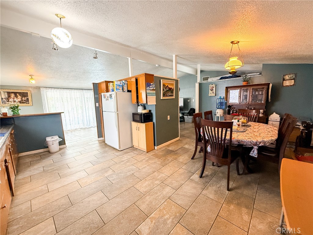 6712 La Jolla Drive Riverside, CA 92504 - Photo 8 of 29 a view of a dining room with furniture