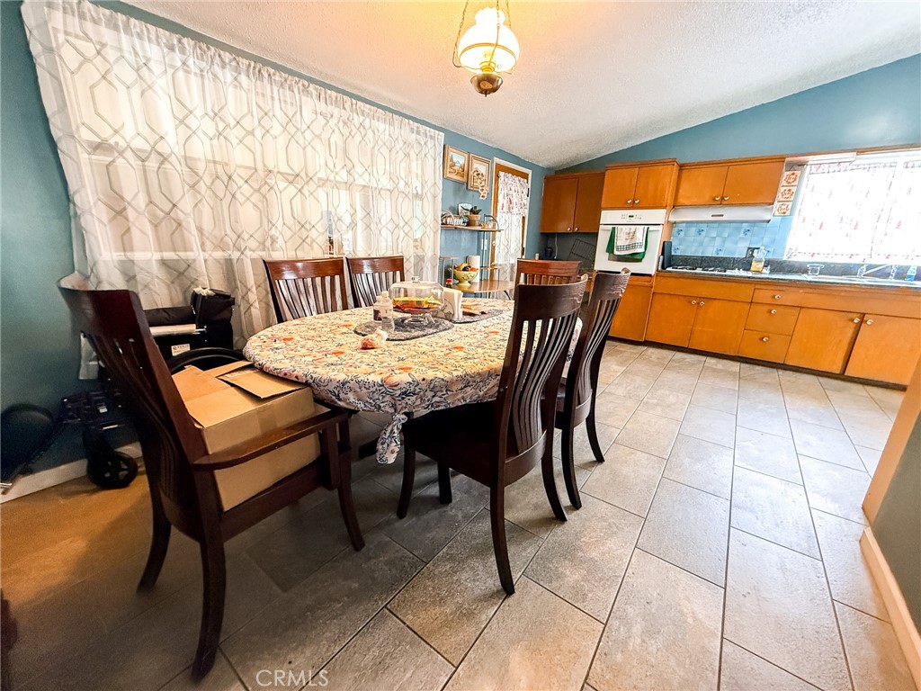 6712 La Jolla Drive Riverside, CA 92504 - Photo 9 of 29 a view of a dining room with furniture window and outside view