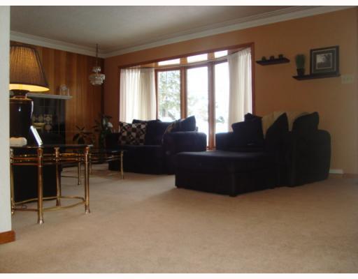 604 Harrison City Road Trafford, PA 15085 - Photo 4 of 18 Living Room. Large Rooms / HUGE Bow Bay Window Seat / Stunning Fireplace / Quality carpeting / Large Entry closet!