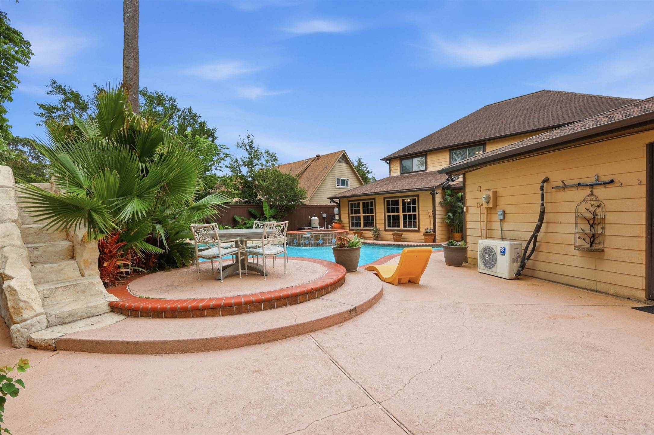 7010 River Mill Drive Spring, TX 77379 - Photo 25 of 29 a backyard of a house with seating space