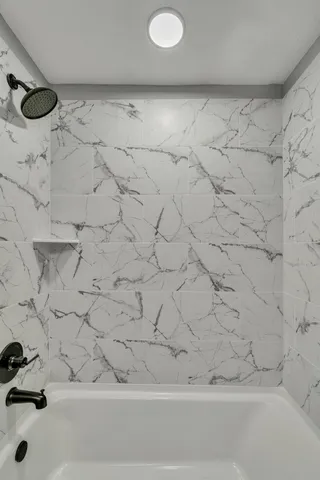 a bathroom with a bathtub