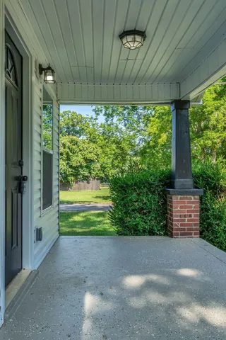 a view of a back yard from a room