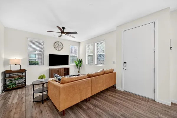 a kitchen with stainless steel appliances a refrigerator and a stove top oven