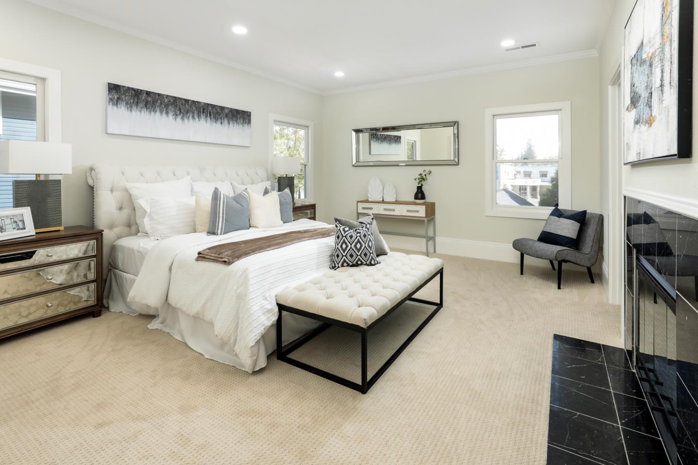 694 Morse Street San Jose, CA 95126 - Photo 16 of 38 a bedroom with a bed mirror and window