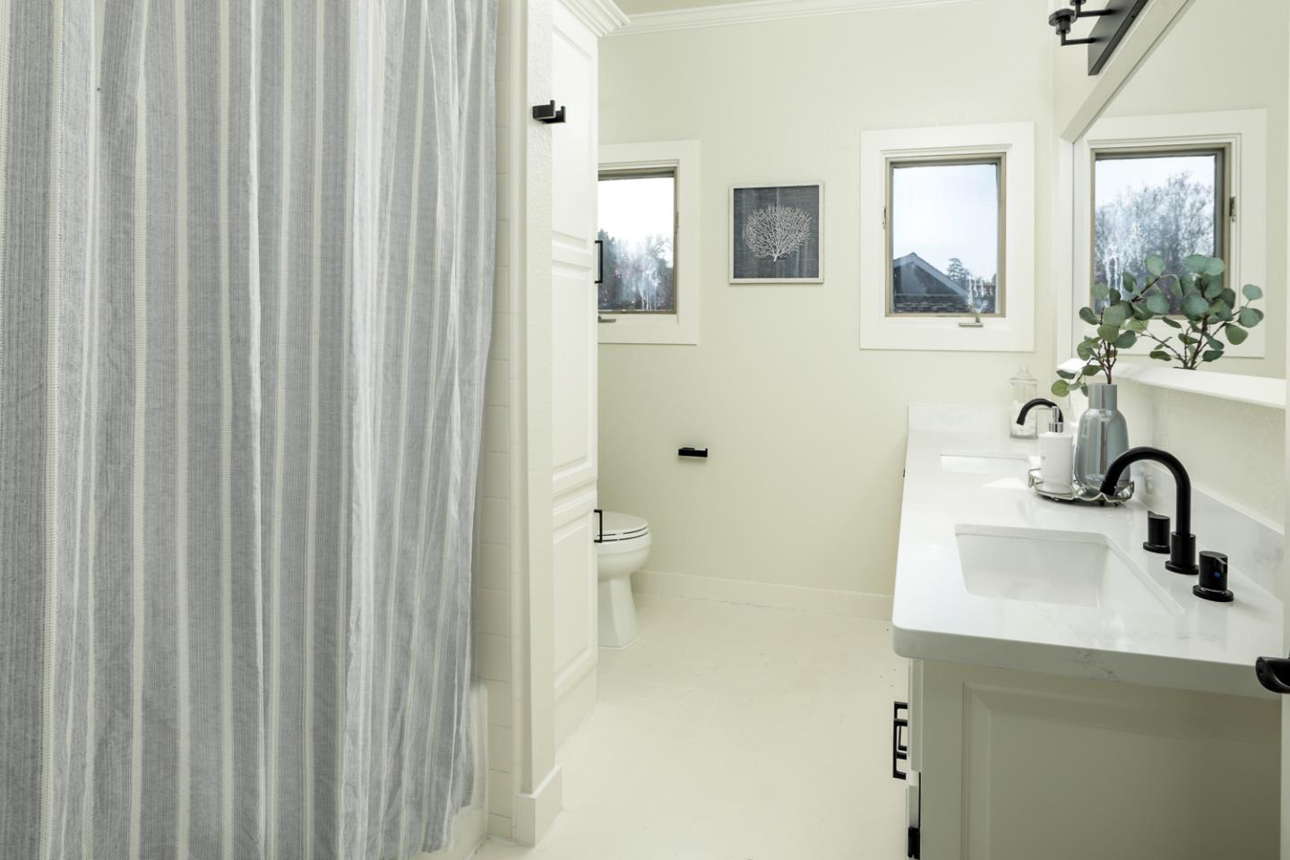 694 Morse Street San Jose, CA 95126 - Photo 25 of 38 a bathroom with a sink toilet and shower