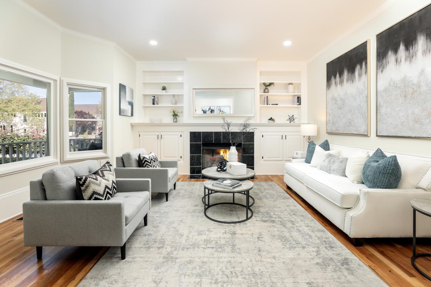 694 Morse Street San Jose, CA 95126 - Photo 4 of 38 a living room with furniture fireplace and a large window
