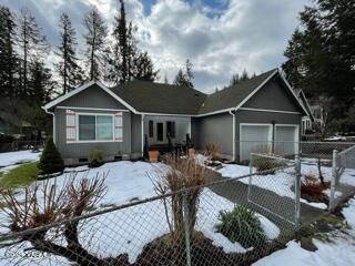 552 Cannon Road Yakima, WA 98901 - Photo 1 of 1 a view of a house with backyard and sitting area