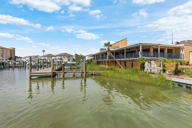a view of a balcony with sitting area