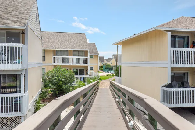 a view of outdoor space with swimming pool and seating