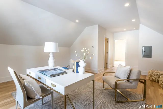 a bathroom with a sink vanity and a mirror