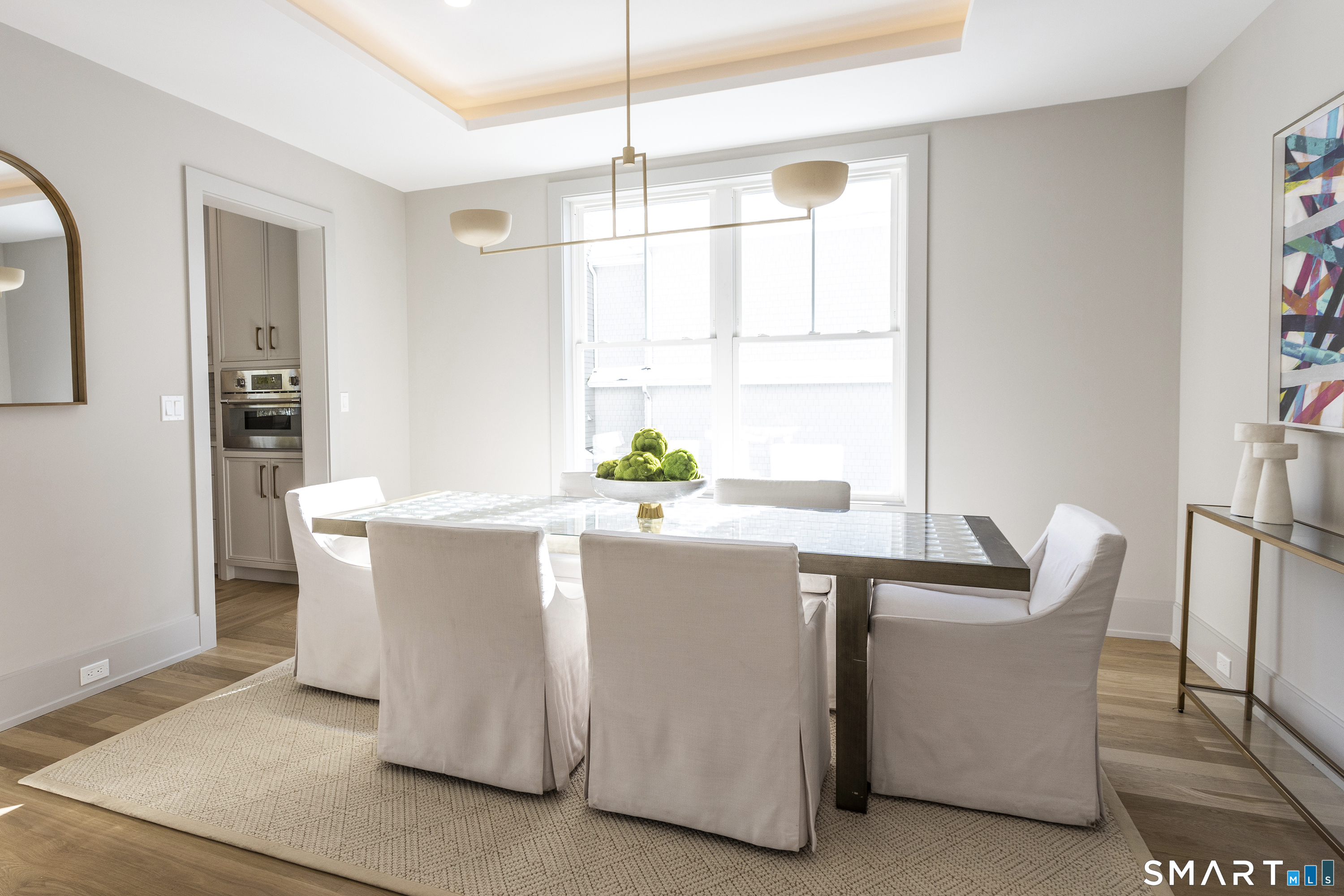10 Wakenor Road Westport, CT 06880 - Photo 3 of 34 Formal dining room with custom LED ceiling detail. Tons of light from southern exposure.