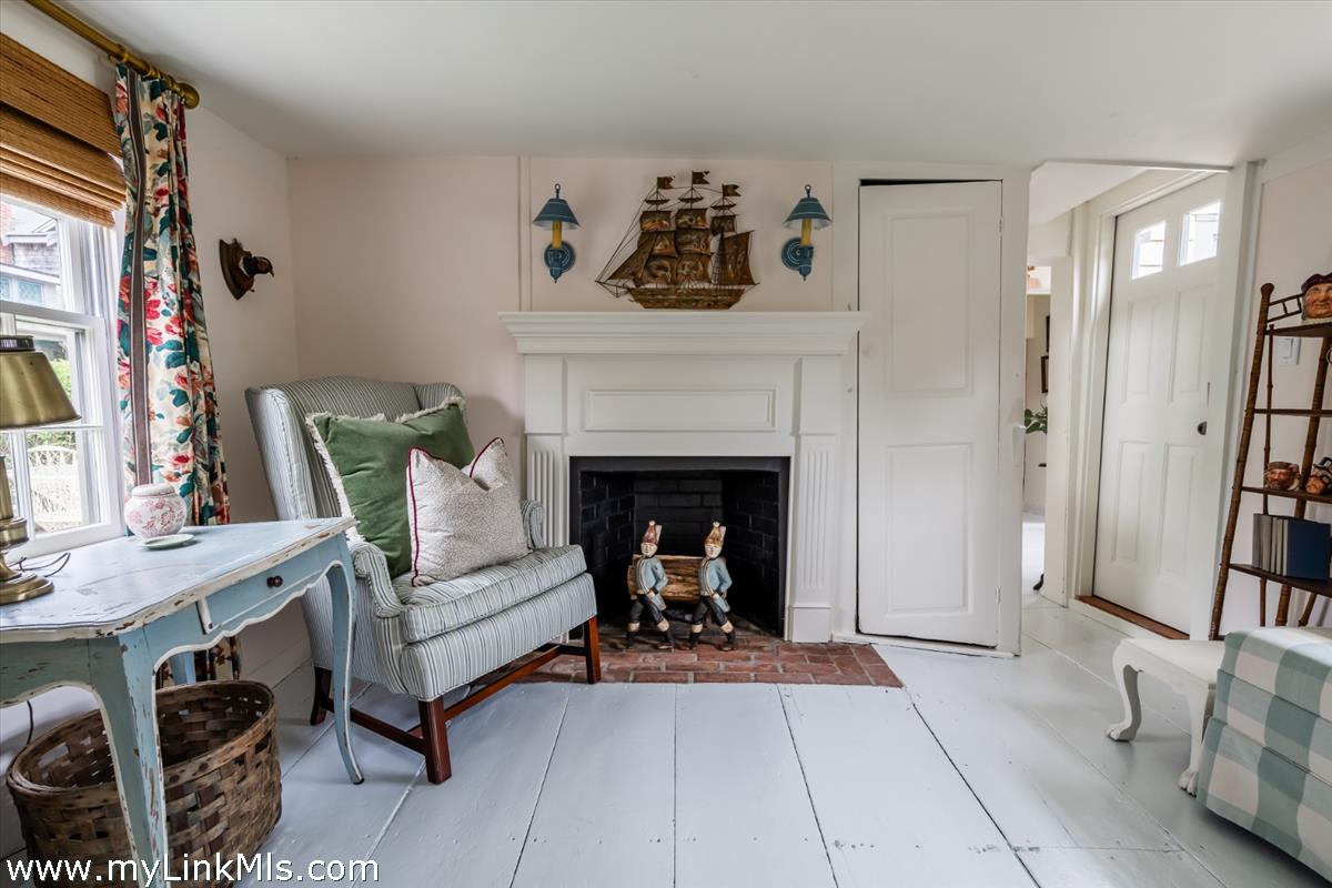 10 Centre Street Nantucket, MA 02554 - Photo 23 of 43 a living room with furniture and a fireplace