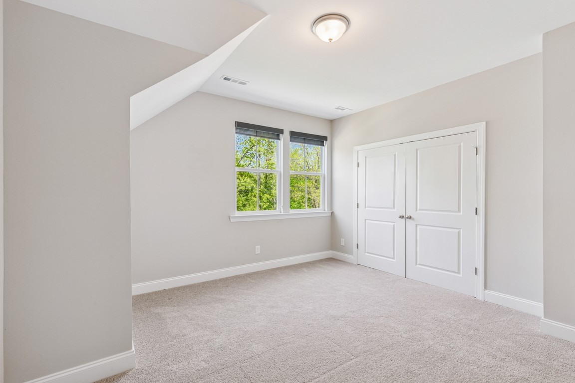 7205 Lake Road Northwest Fairview, TN 37062 - Photo 20 of 28 an empty room with windows