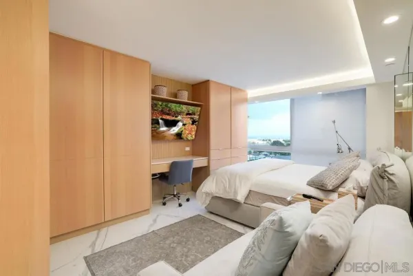 a bed room with a bed and a window