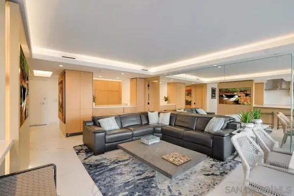 a living room with furniture and a couch