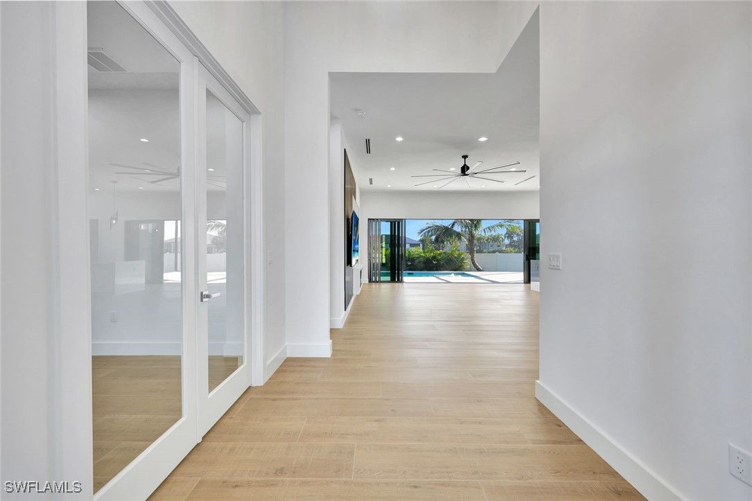 1 Southwest 33rd Place Cape Coral, FL 33991 - Photo 15 of 38 a view of a hallway