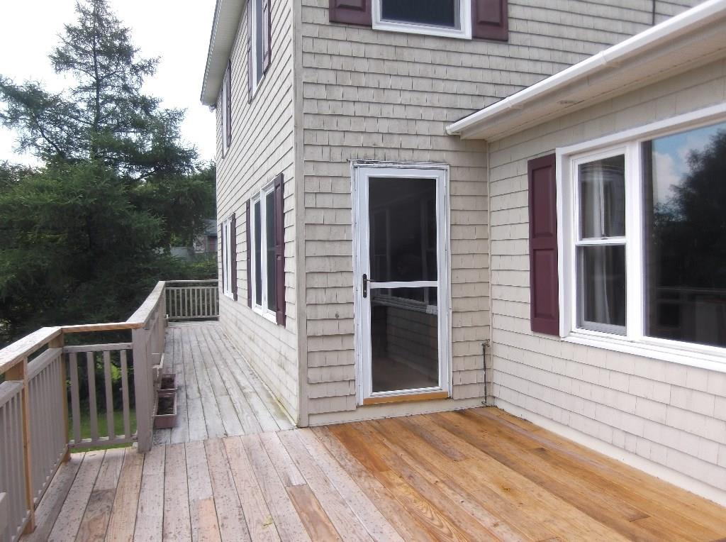 140 Ames Road Dover-Foxcroft, ME 04426 - Photo 22 of 30 Deck continues and door to formal...