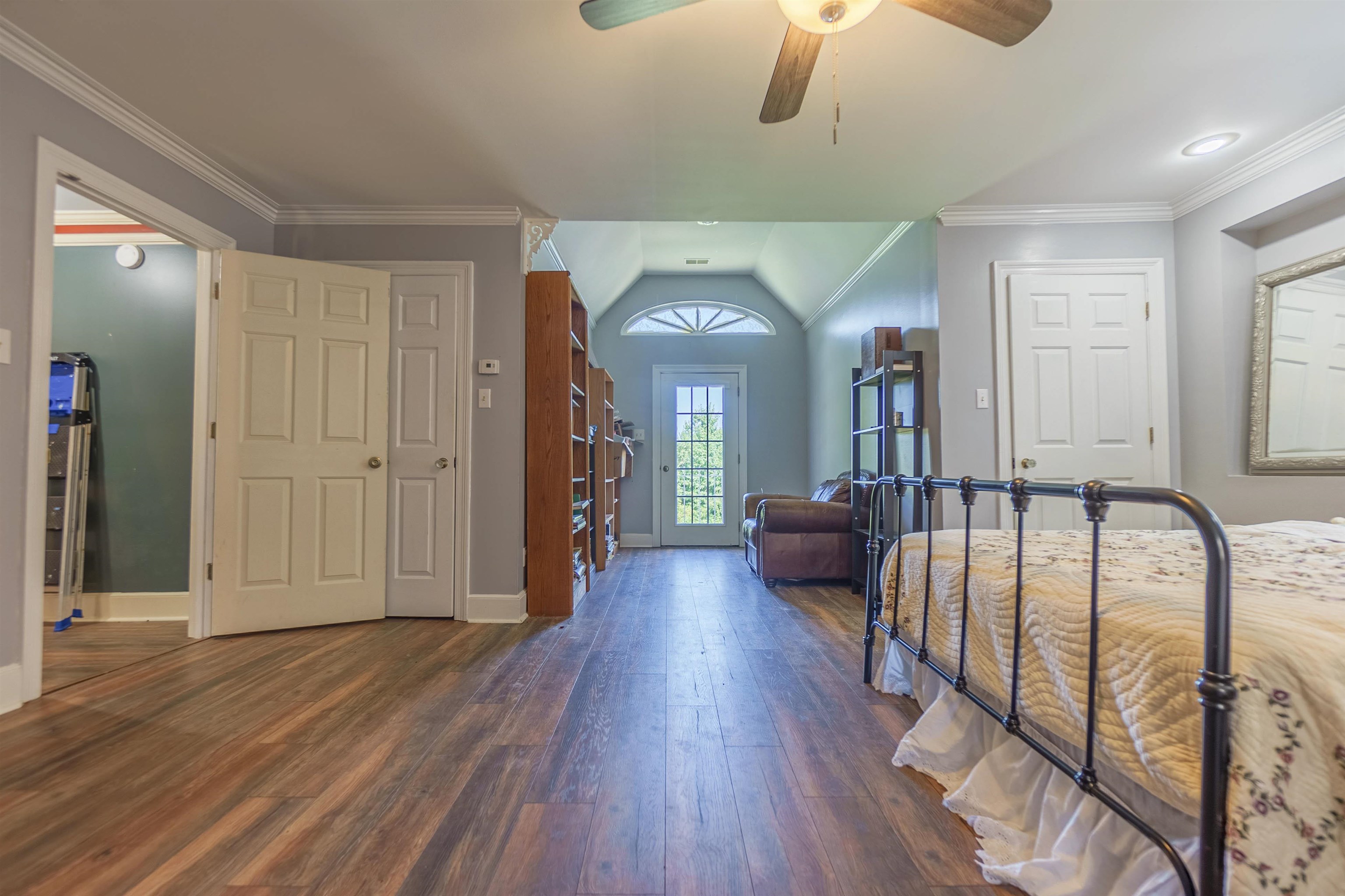 8416 Shakerag Road Millington, TN 38053 - Photo 25 of 30 Bedroom with dark wood-type flooring, ornamental molding, ceiling fan, and vaulted ceiling