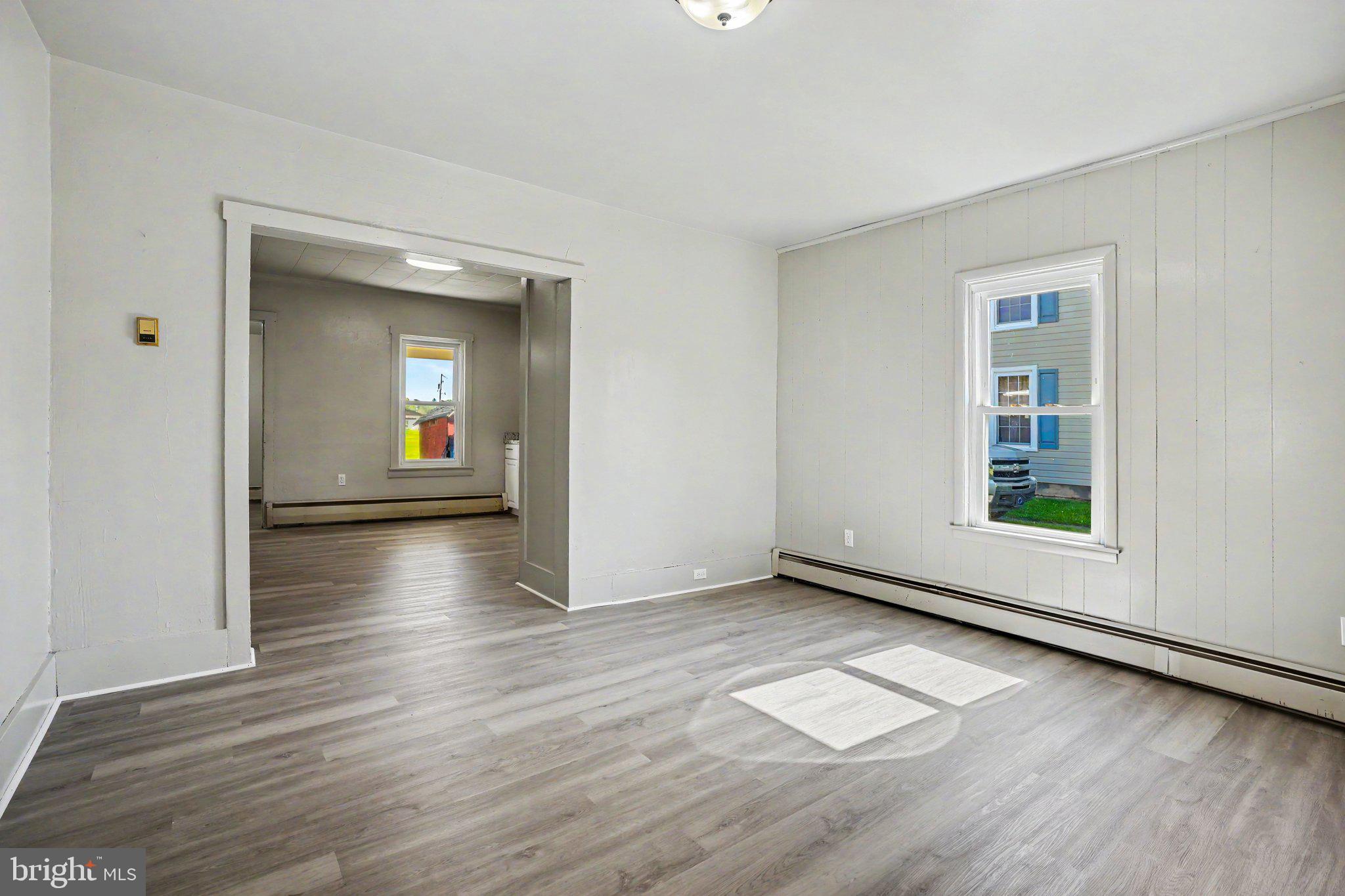 1441 North River Road Granville, PA 17029 - Photo 11 of 28 a view of a livingroom with wooden floor and a window