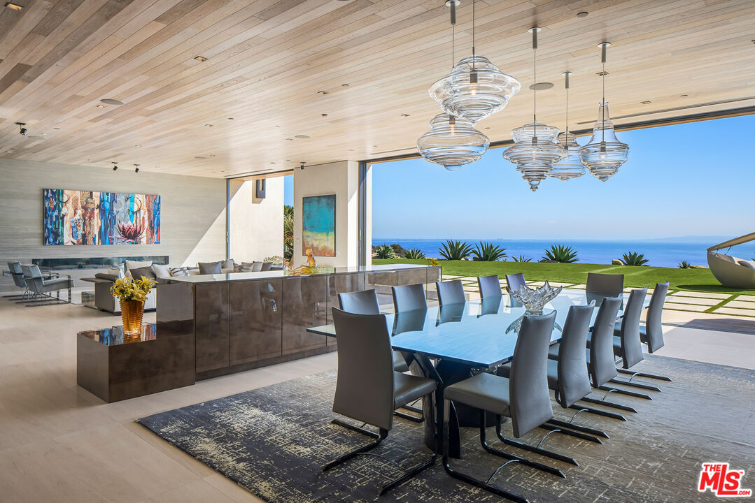 5046 Carbon Beach Terrace Malibu, CA 90265 - Photo 15 of 75 a view of a dining room with furniture