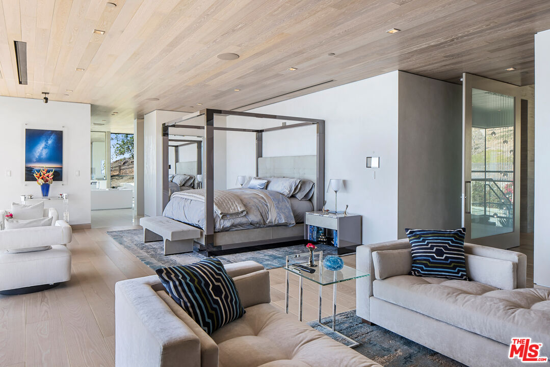 5046 Carbon Beach Terrace Malibu, CA 90265 - Photo 33 of 75 a living room with furniture or couch and a large window