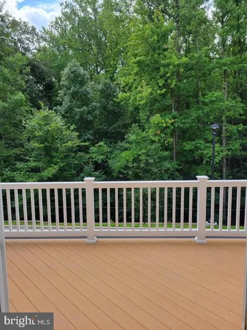 a bathroom with a bath tub and shower
