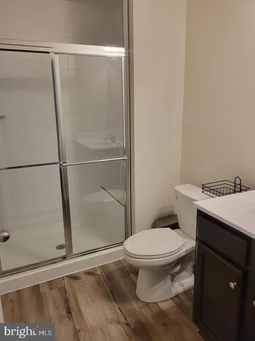 a view of a balcony with wooden floor