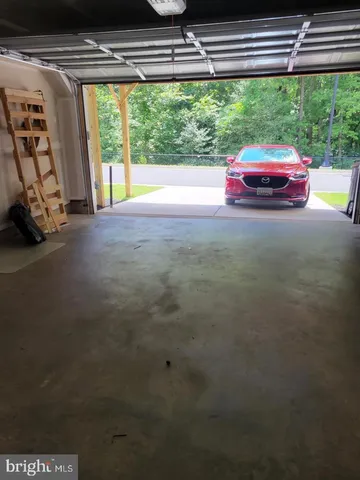 a view of balcony with wooden floor