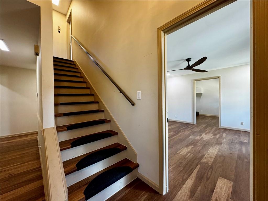 1709 Rangewood Drive Southwest Lilburn, GA 30047 - Photo 26 of 52 a view of entryway and hall with wooden floor