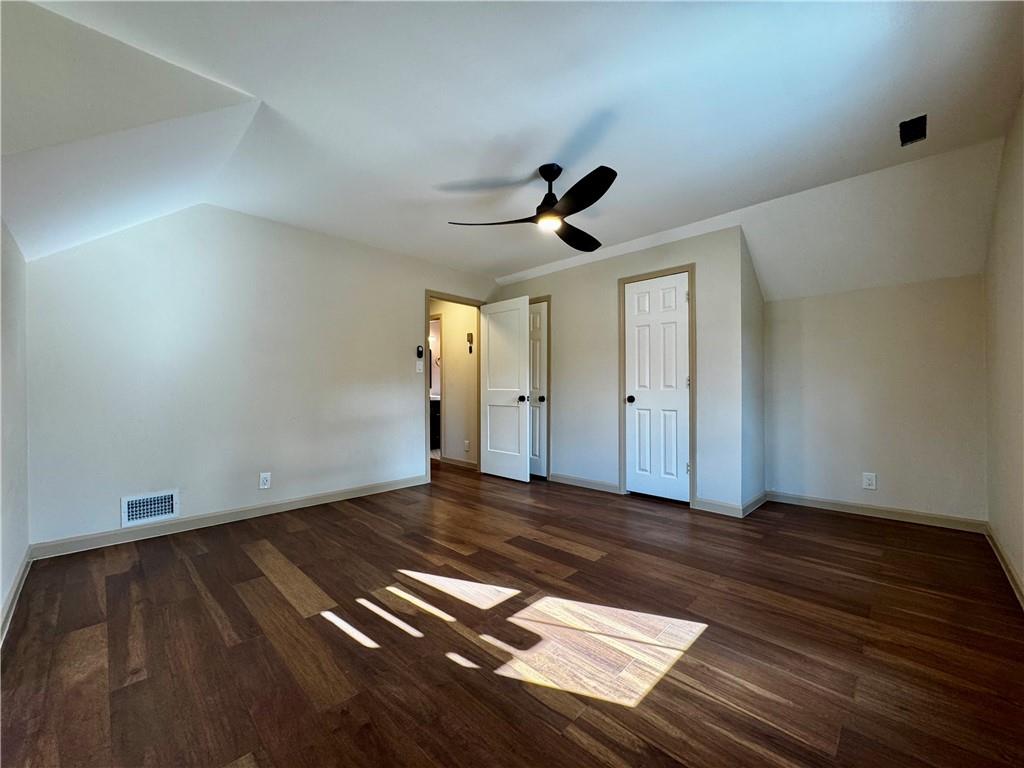 1709 Rangewood Drive Southwest Lilburn, GA 30047 - Photo 39 of 52 a view of an empty room and wooden floor