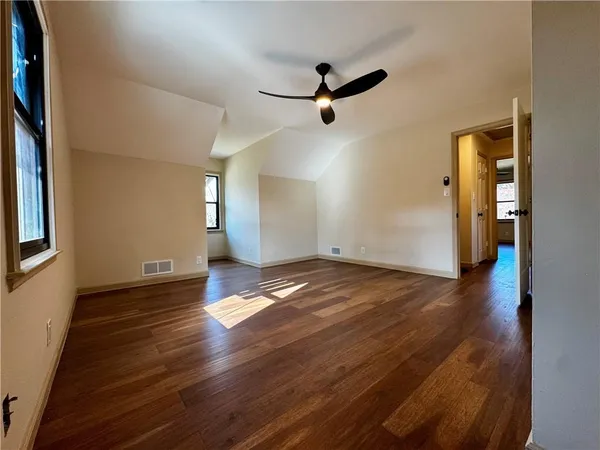 a bathroom with 2 sink and a mirror