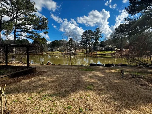 a view of a lake with houses