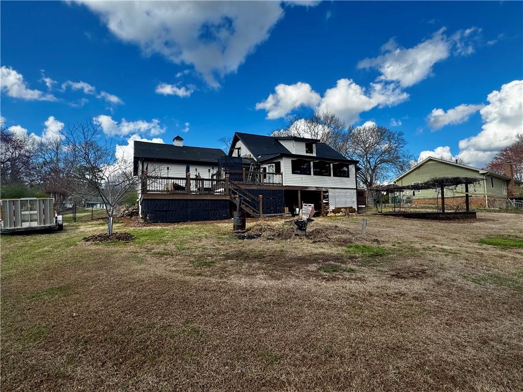 1709 Rangewood Drive Southwest Lilburn, GA 30047 - Photo 52 of 52 a view of a house with a yard