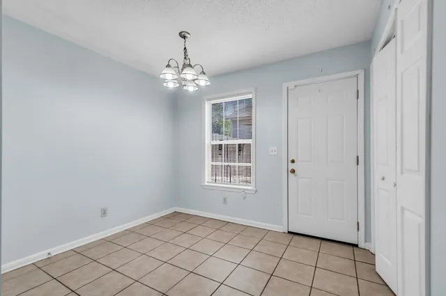 a view of an empty room with window