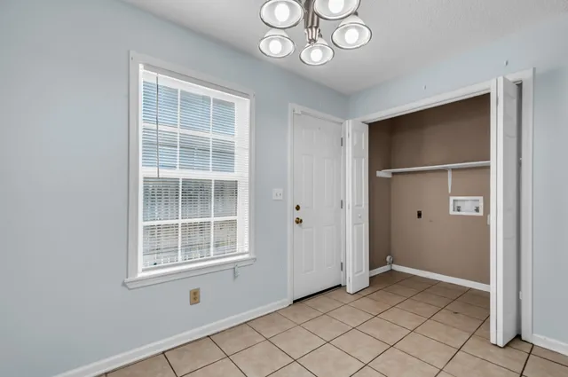 an empty room with windows