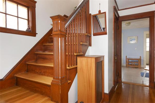 91 Ronald Road Arlington, MA 02474 - Photo 11 of 26 a view of entryway and hall with wooden floor
