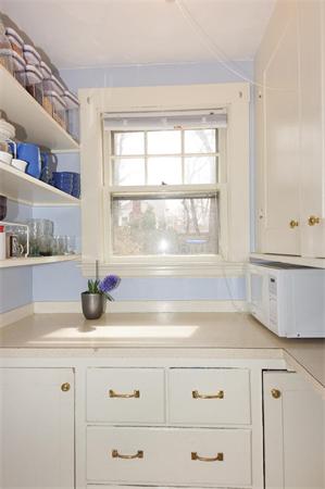 91 Ronald Road Arlington, MA 02474 - Photo 17 of 26 a kitchen with a sink and a window