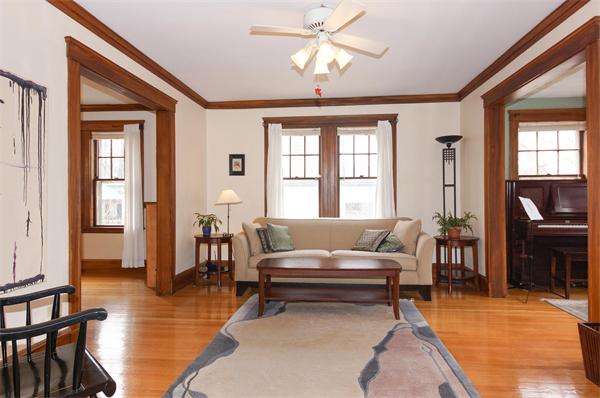 91 Ronald Road Arlington, MA 02474 - Photo 2 of 26 a living room with furniture a piano and a dining table