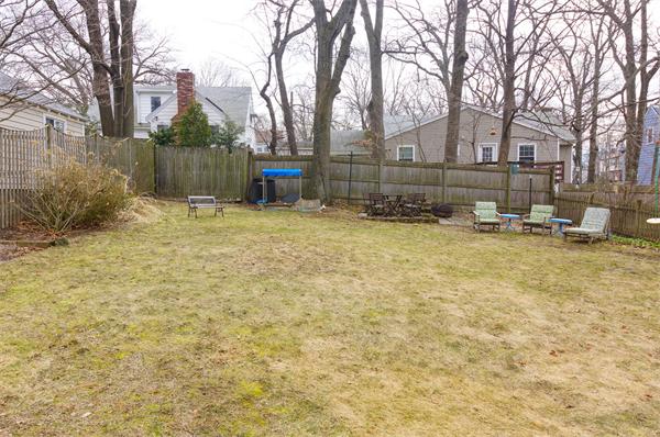 91 Ronald Road Arlington, MA 02474 - Photo 21 of 26 a backyard of apartments with large trees