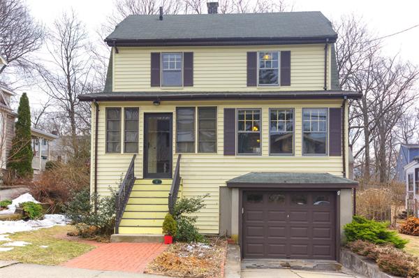 91 Ronald Road Arlington, MA 02474 - Photo 22 of 26 a view of brick house with large windows
