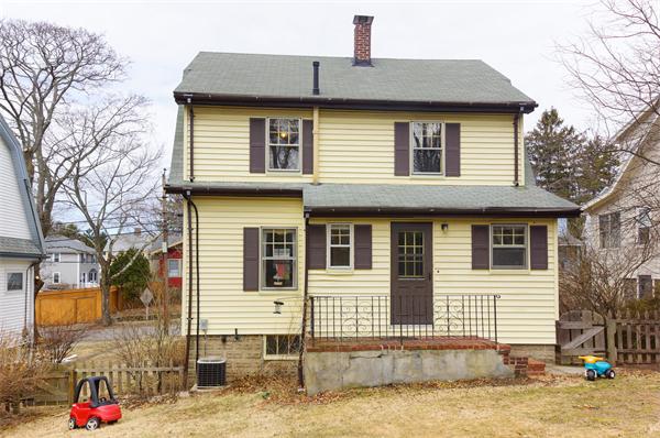 91 Ronald Road Arlington, MA 02474 - Photo 23 of 26 a front view of a house with a yard