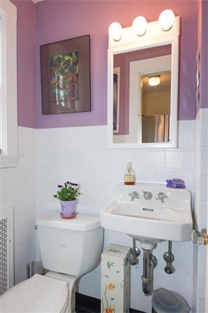 91 Ronald Road Arlington, MA 02474 - Photo 9 of 26 a bathroom with a sink mirror and toilet