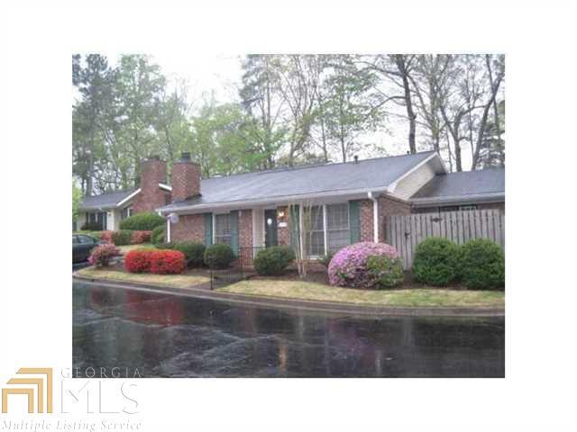 1113 Moorestown Circle Decatur, GA 30033 - Photo 1 of 1 a front view of a house with a yard