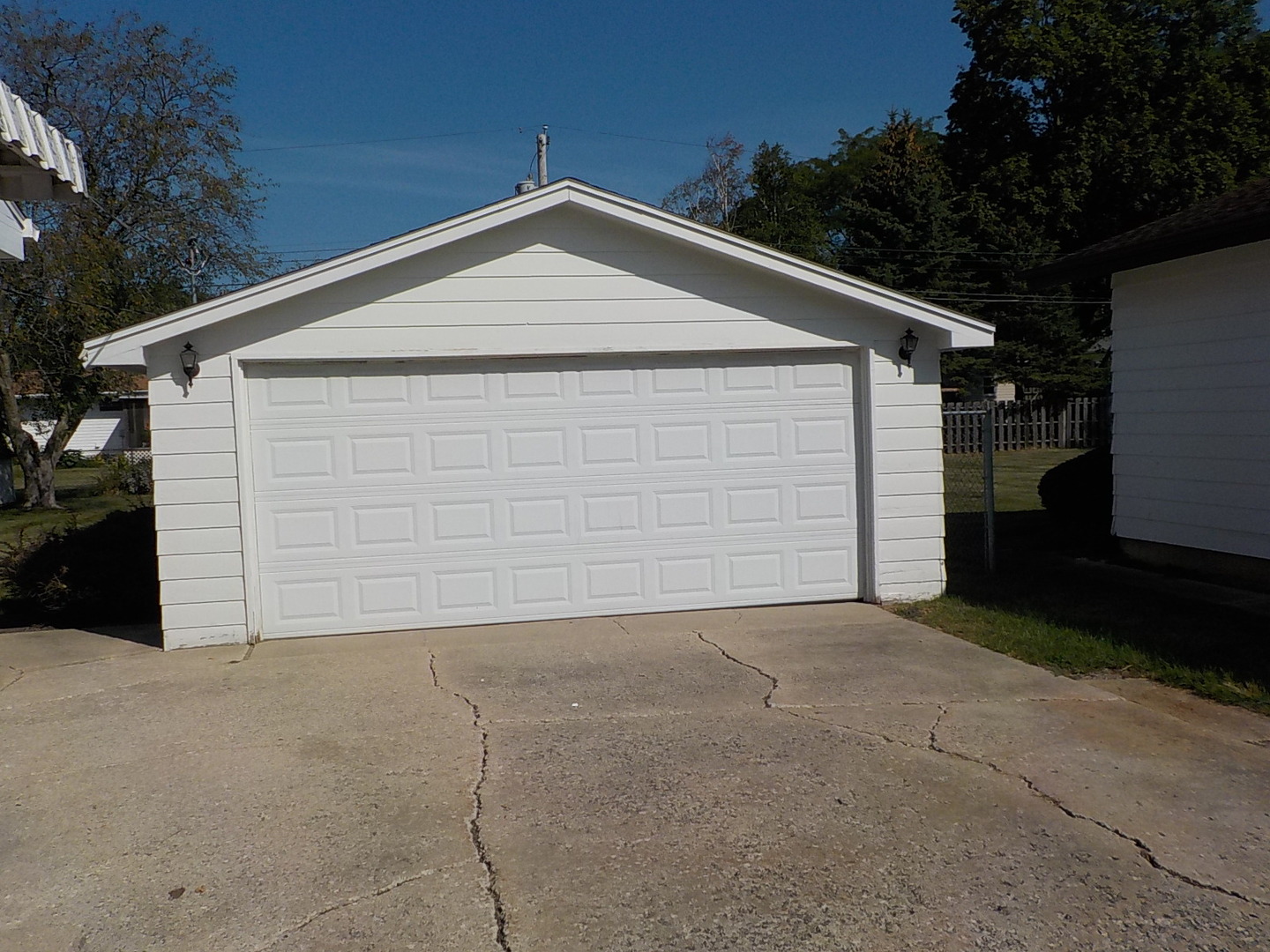 104 Janet Avenue Rochelle, IL 61068 - Photo 2 of 14 a view of garage and yard